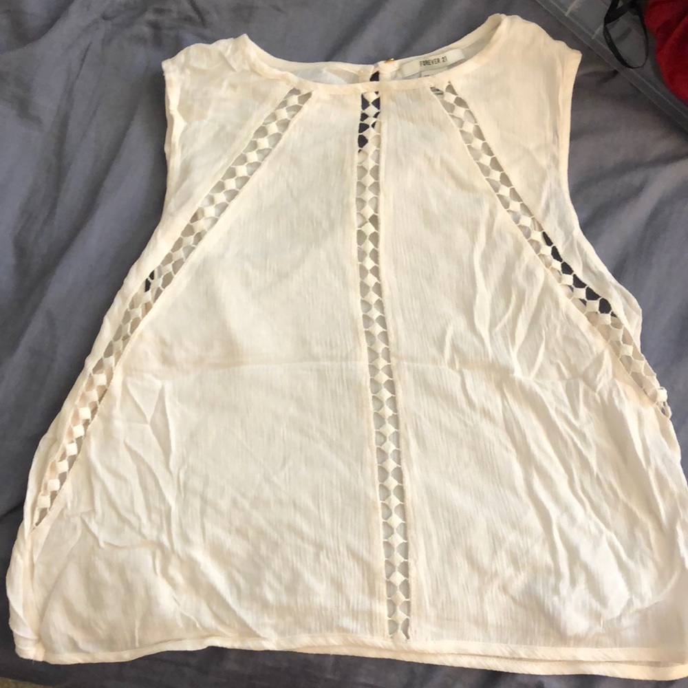 Sleeveless white shirt